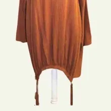 Detailaufnahme des Baumwoll-Musselins mit weicher Struktur und natürlichem Faltenwurf.